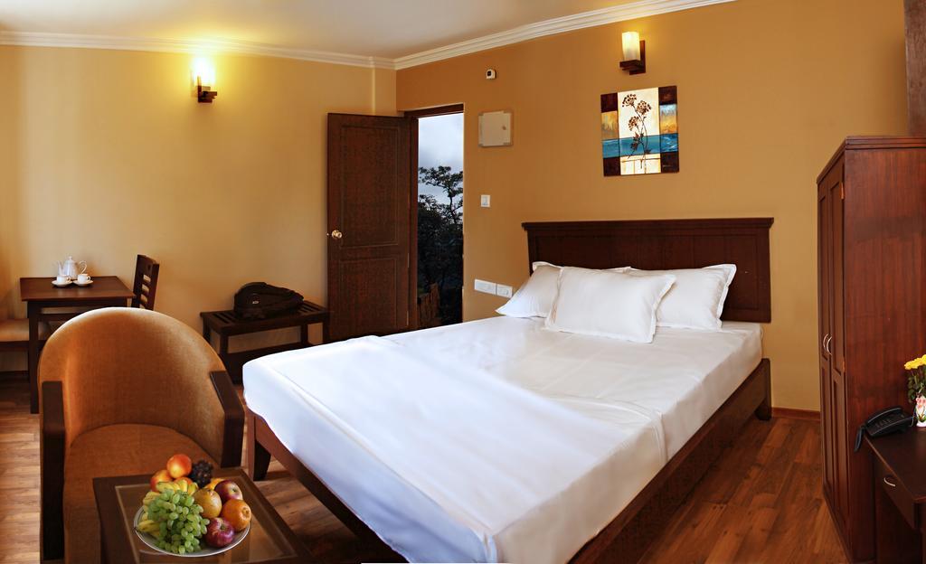 מאננטהוואדי Century Grand Hotel חדר תמונה